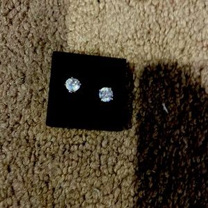 New cubic zirconia earrings selling because I got a duplicate pair